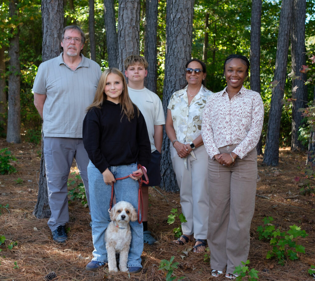 Brittany King r Childrens Home Society of North Carolina Success Coach with the Meyer family. Photo credit Alvin C. Jacobs Jr - | The Leon Levine Foundation